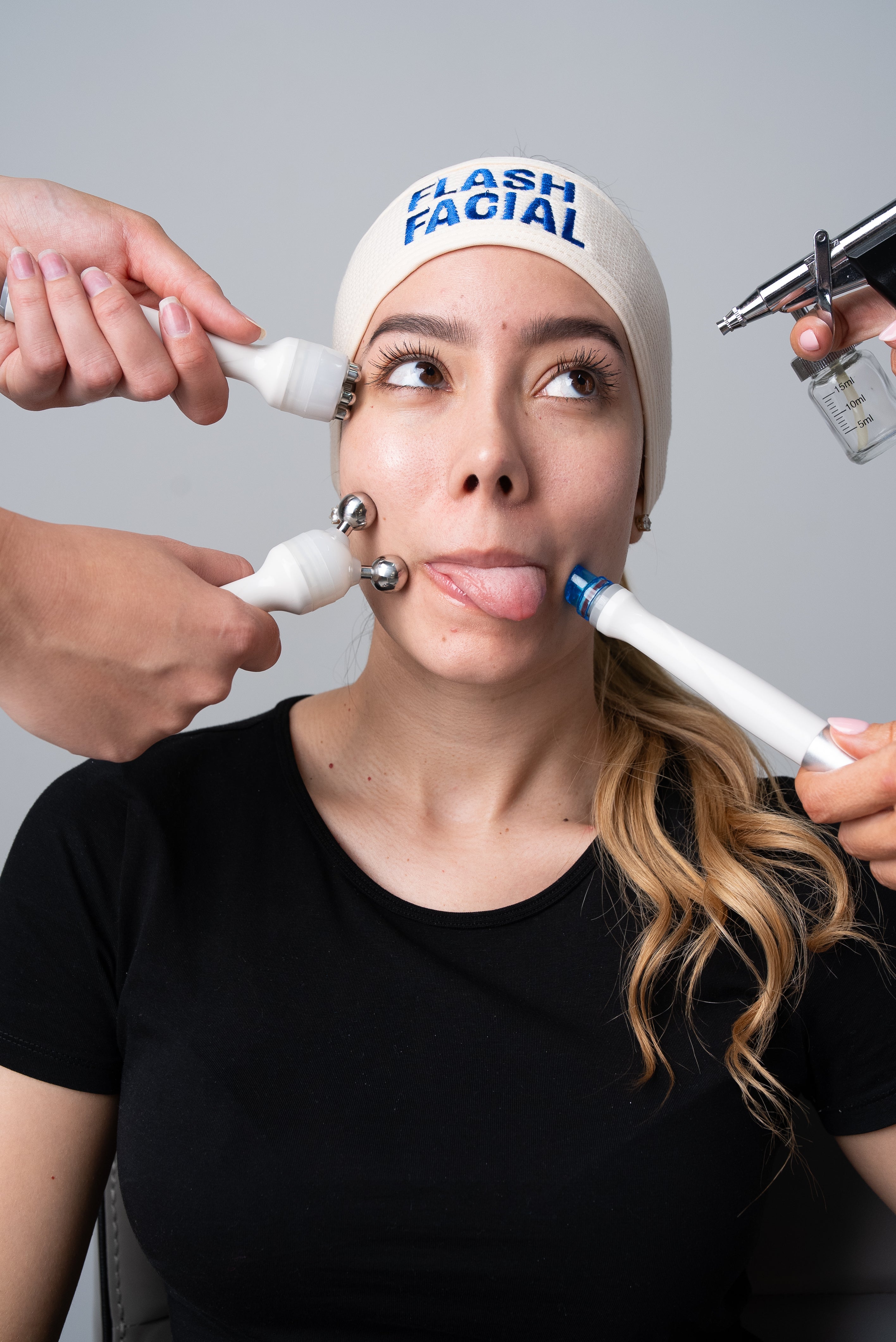 Technician performing HydraFacial in clean clinic setting - Flash Facial effective express skincare treatment